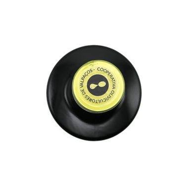 Black and yellow wine bottle cap on a white background