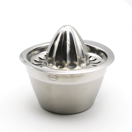 Stainless steel manual juicer on a white background
