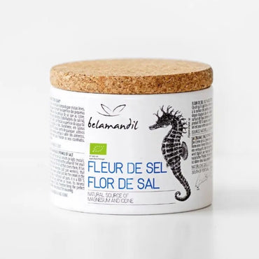 container of 'Fleur de Sel' with a cork lid on a white background