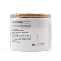 Container with a textured lid on a white background