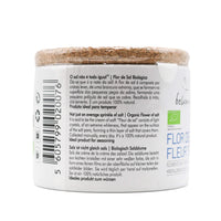 Back of a container with a label on a white background